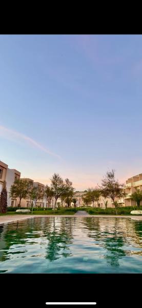 Duplex vue plage et piscine
